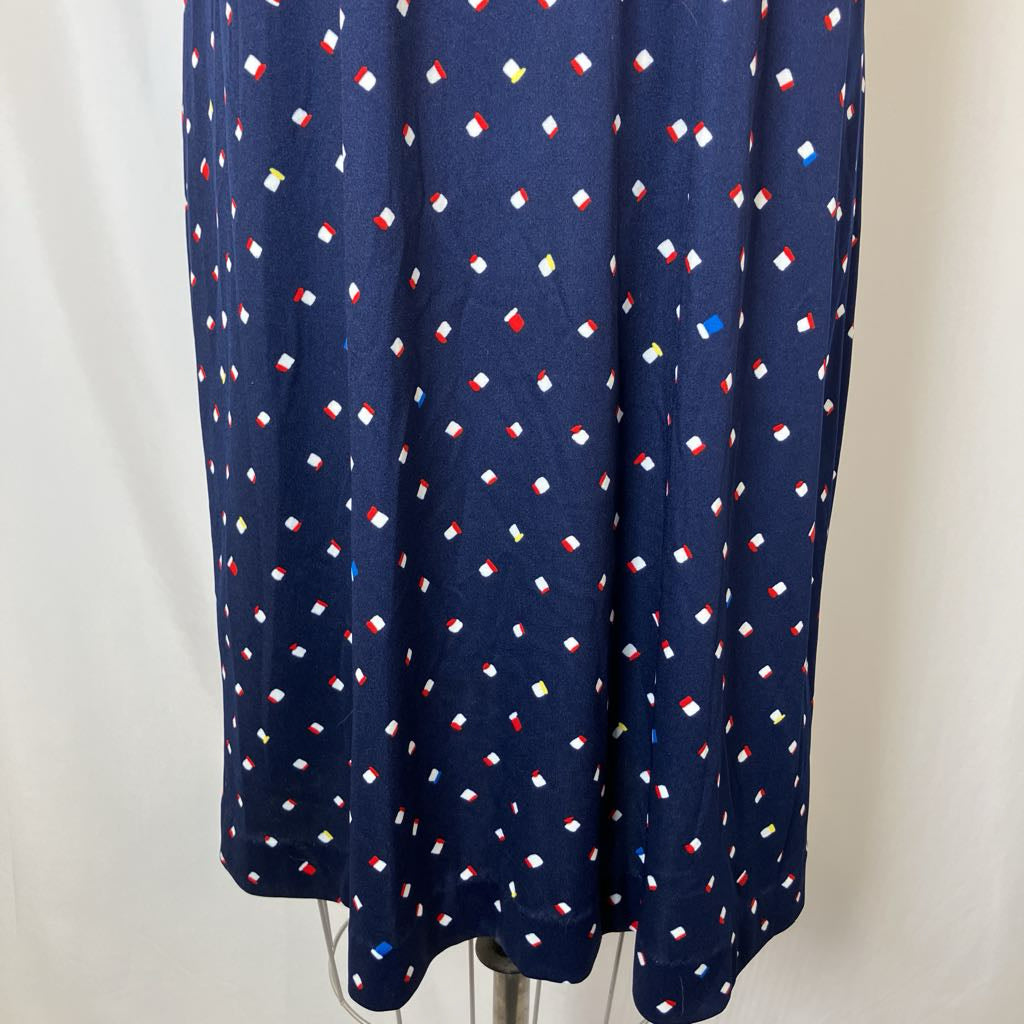 Navy blue dress with colorful pattern on a white background