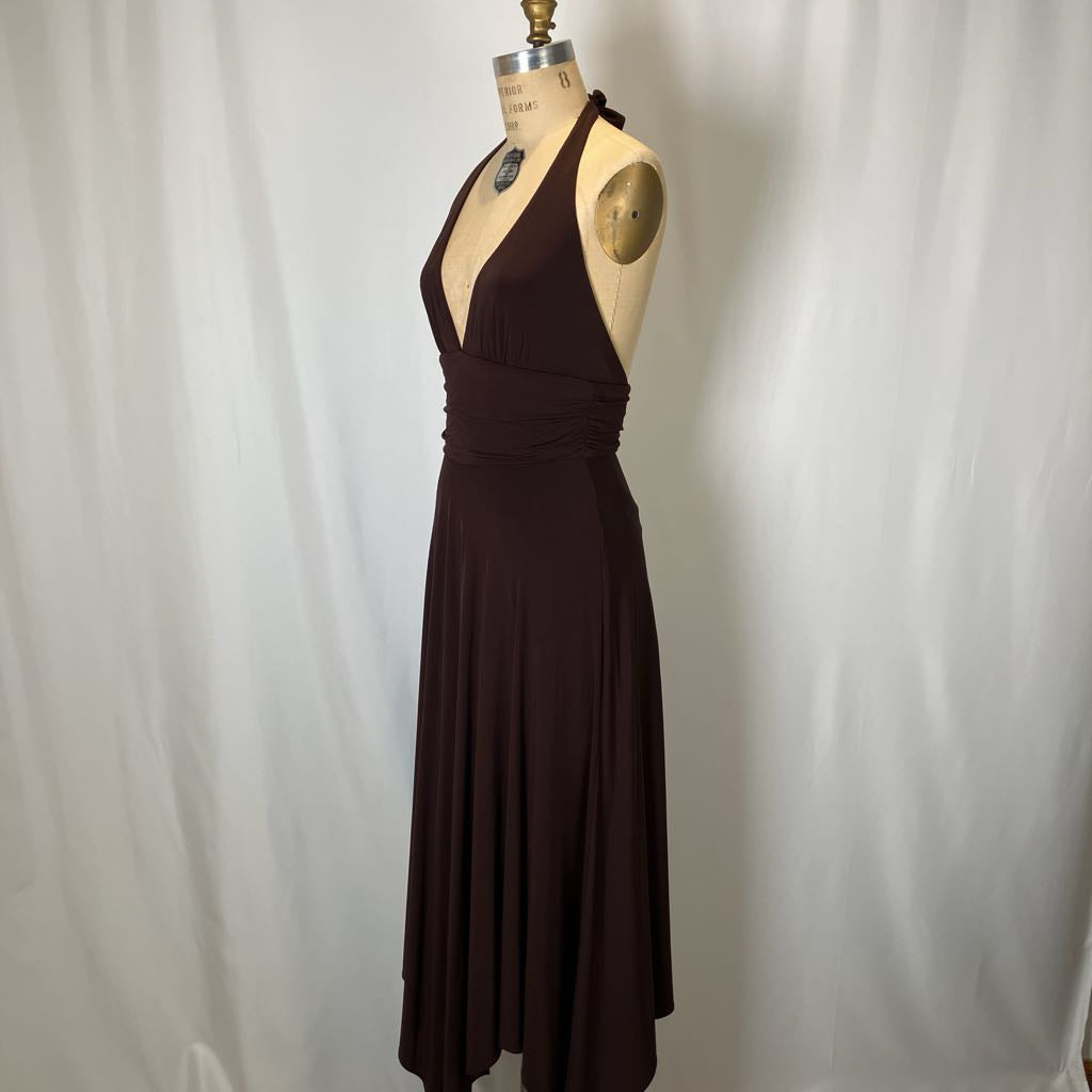 Brown dress on a mannequin against a white background