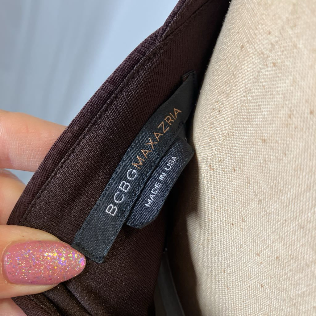 Close-up of BCBG Max Azria label on a garment with a blurred background