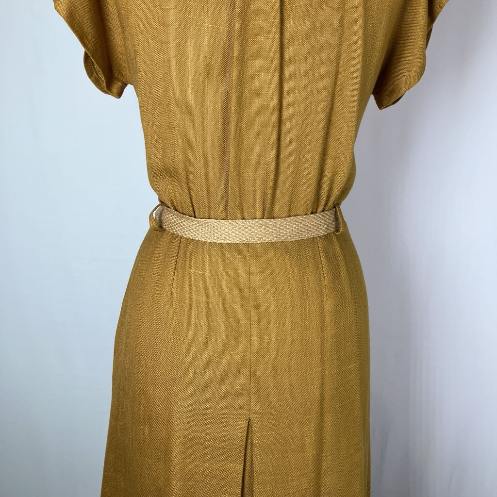 A mustard yellow linen dress with a matching woven belt, shown on a mannequin against a light gray background.