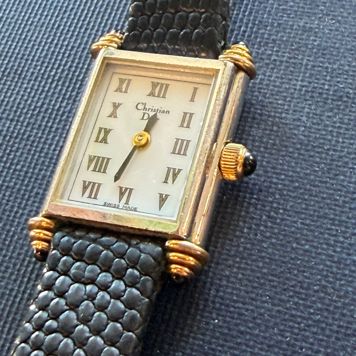 Showing the face of the Christian Dior tank watch