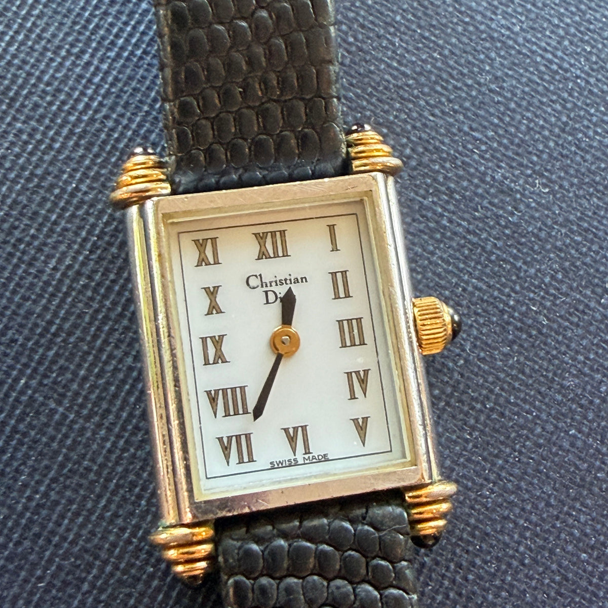 Close up of the face of a Vintage Christian Dior Tank Watch