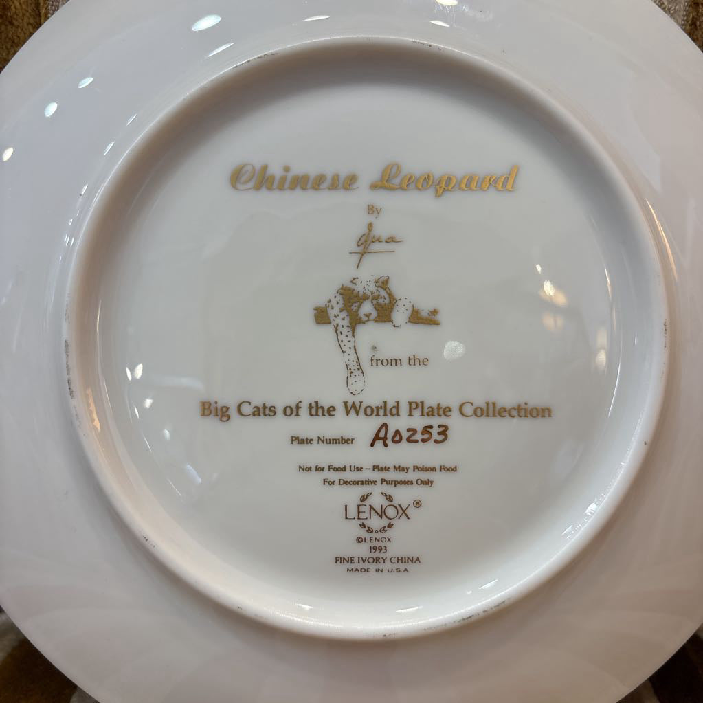 The back of a decorative plate with information about the company who produced it.