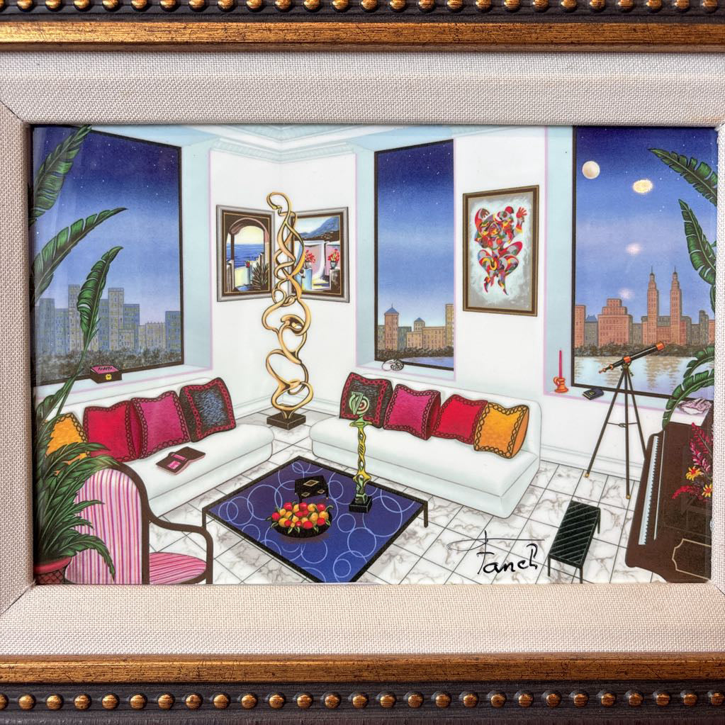 A framed artwork of a room and a nigh time cityscape outside of the windows.