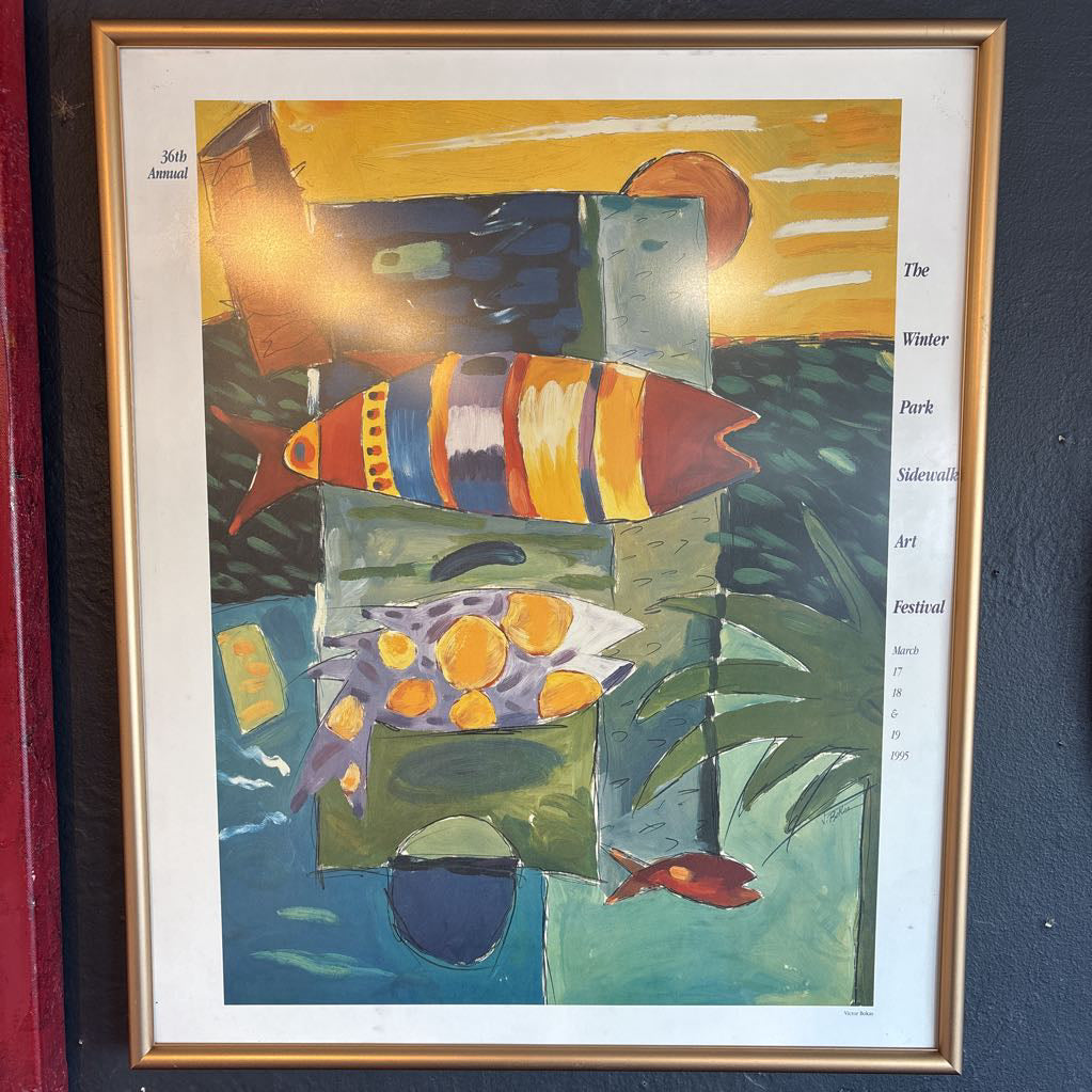 A colorful abstract artwork of fishes with the words, "36th Annual The Winter Park Sidewalk Art Festival" around the edge of the work.