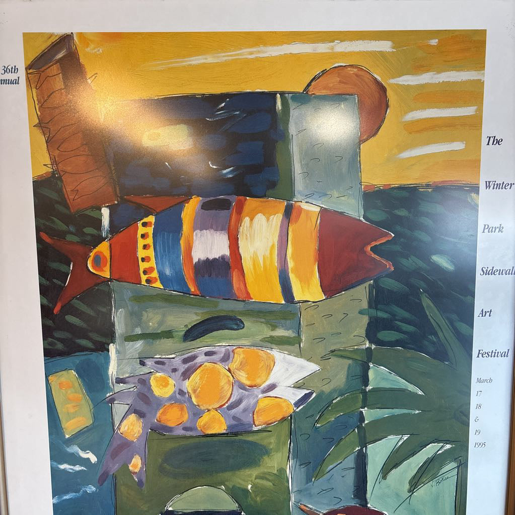 A colorful abstract artwork of fishes with the words, "36th Annual The Winter Park Sidewalk Art Festival" around the edge of the work.