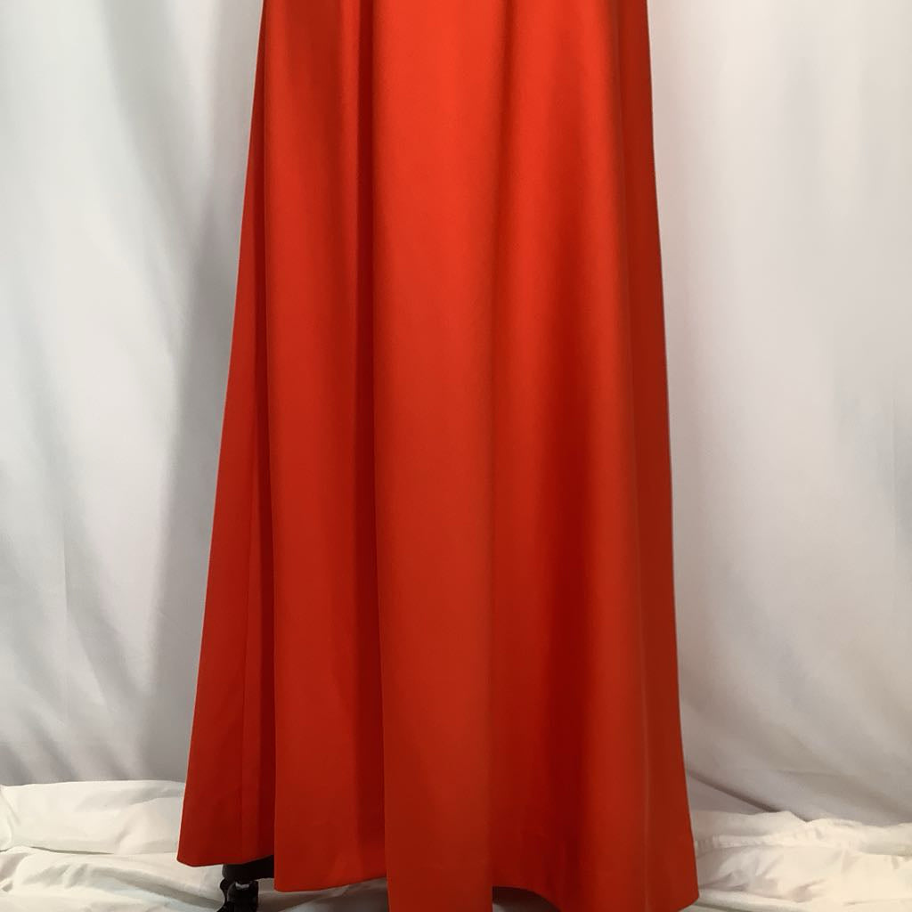 Orange curtain against a white background