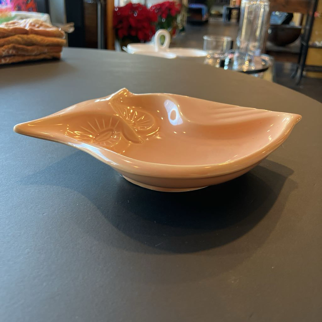 Ceramic bowl on a gray surface with a blurred background