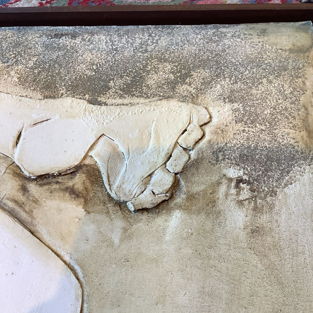 Close-up of a textured surface with beige and brown tones