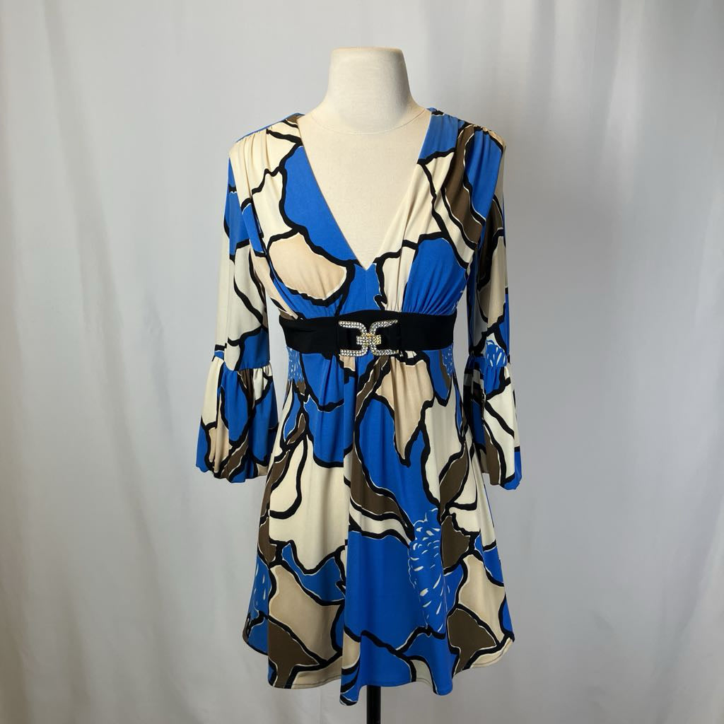 Blue and white patterned dress with a rhinestone buckle against a white background. 