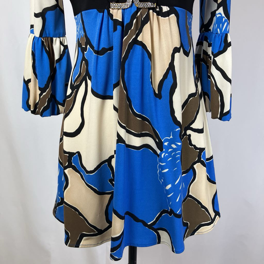 Colorful dress with abstract pattern on a plain background