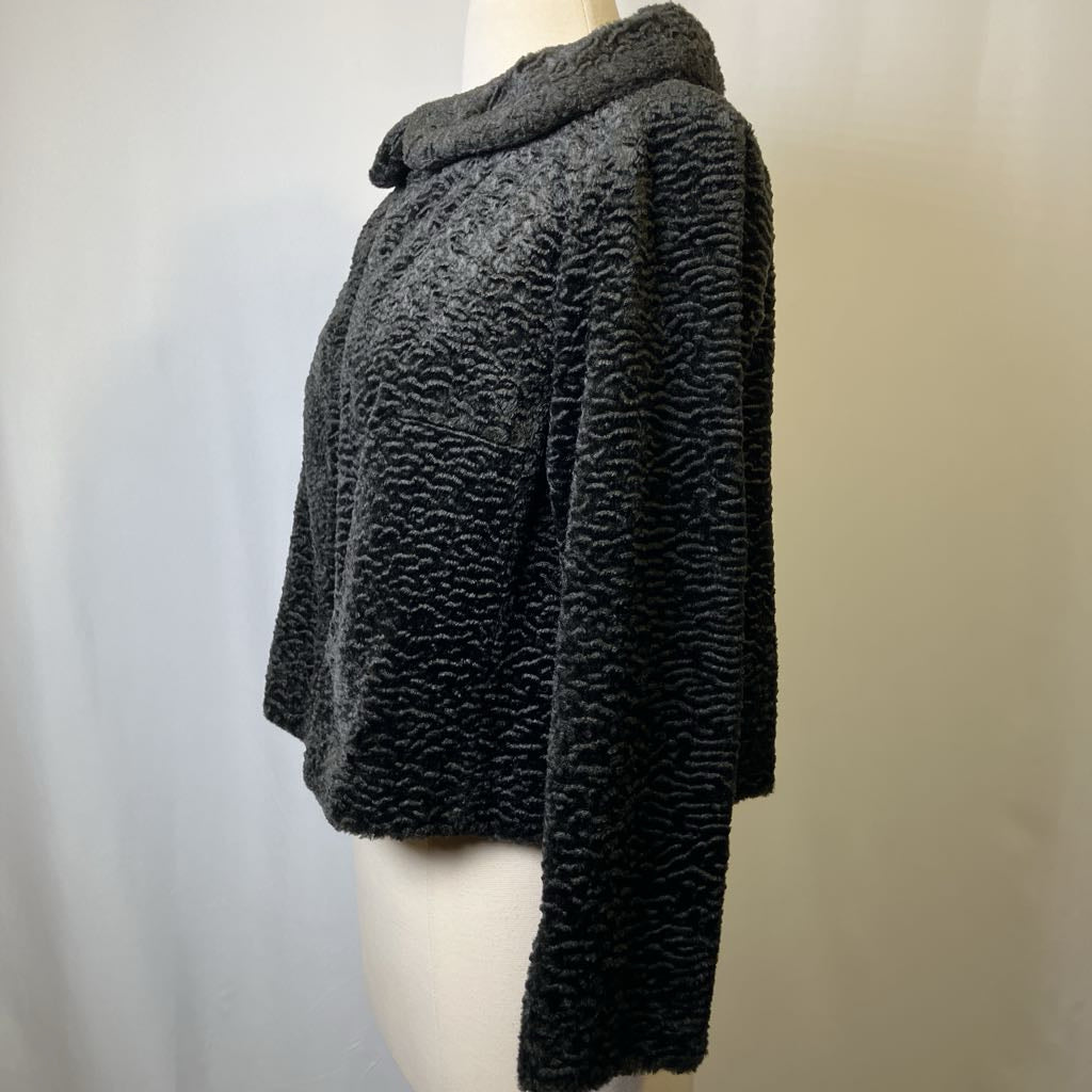 Dark gray textured sweater on a mannequin against a plain background