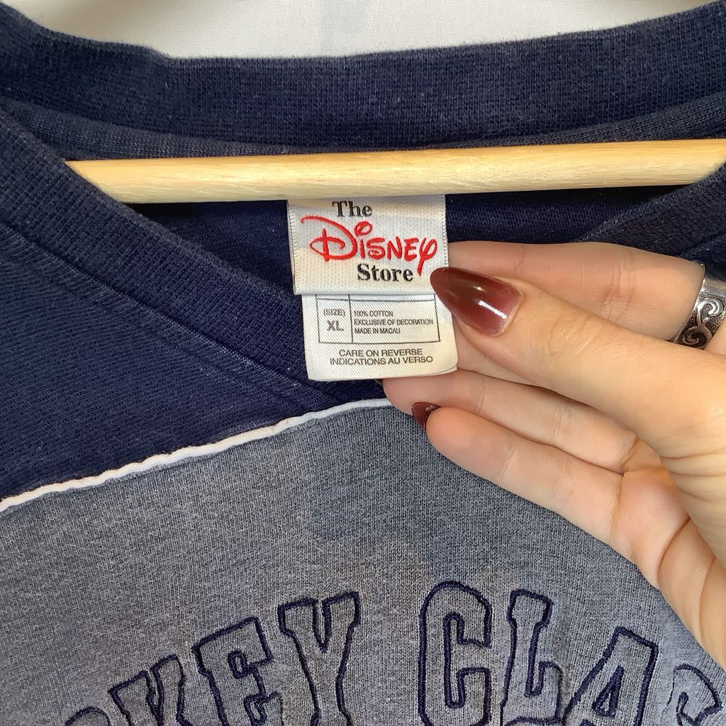 Tag Reads The Disney Store
