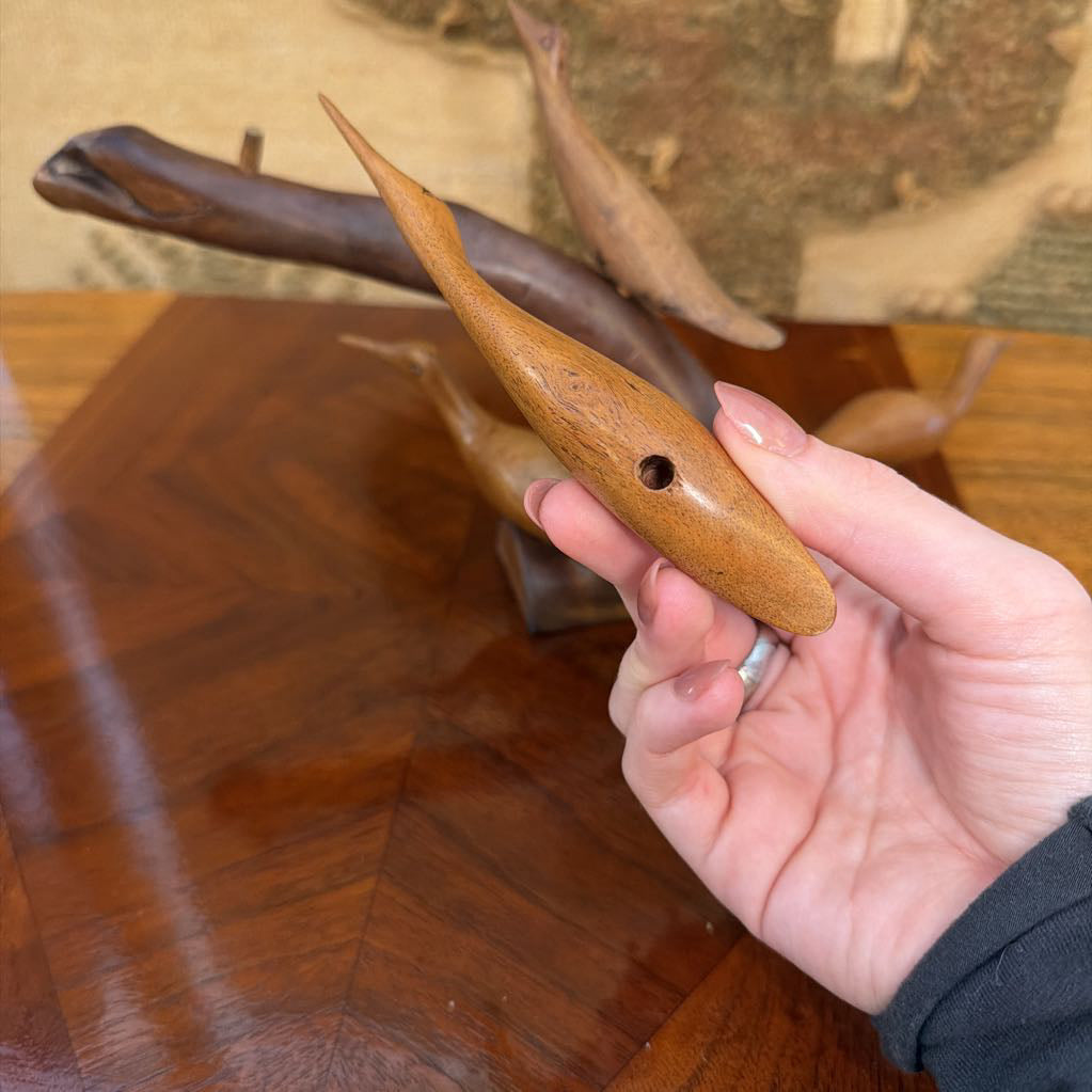 Carved Wood Birds on Limb