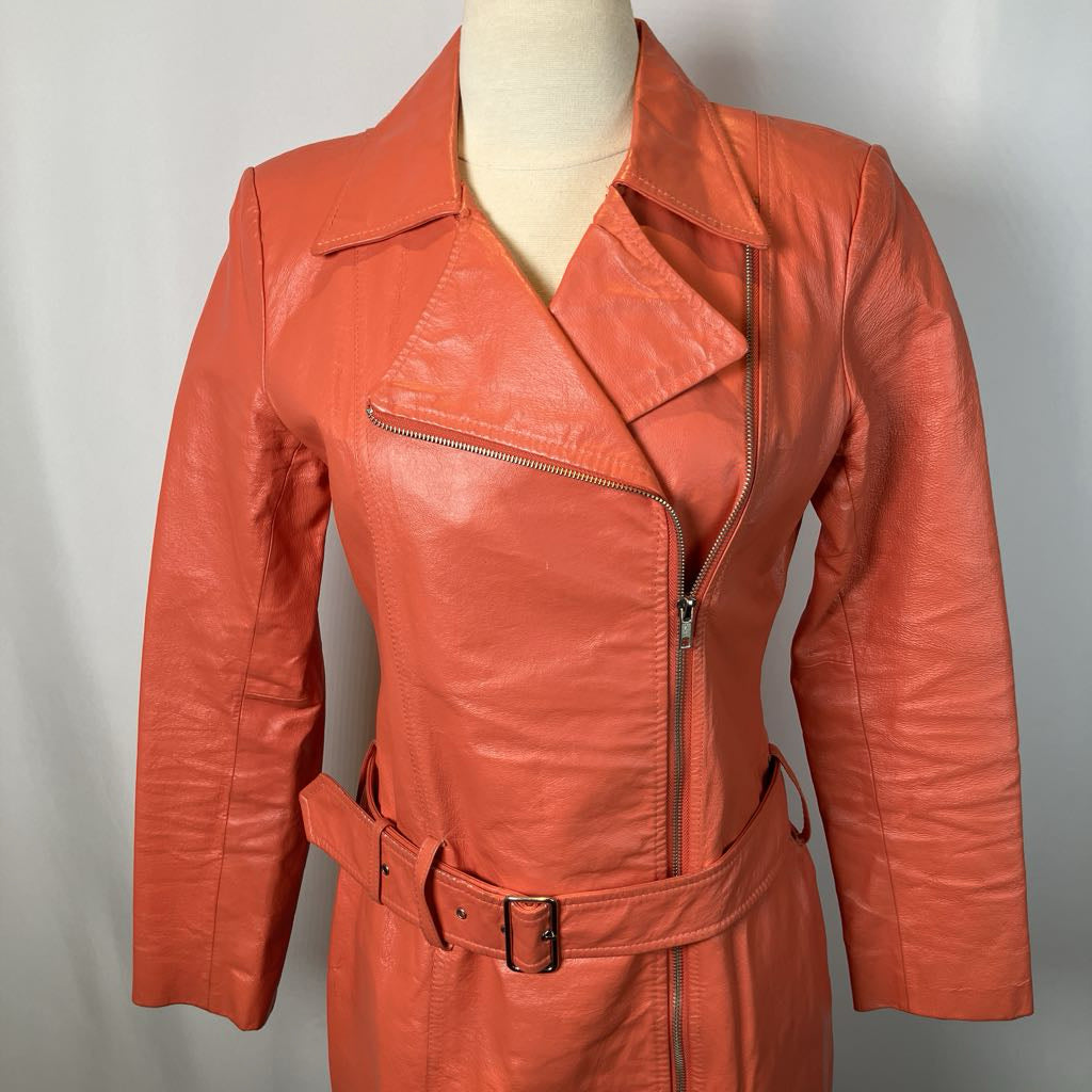 image orange jacket with zippers and belt on mannequin