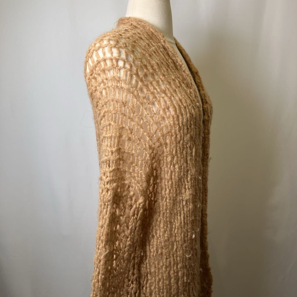 Brown textured sweater on a mannequin against a neutral background