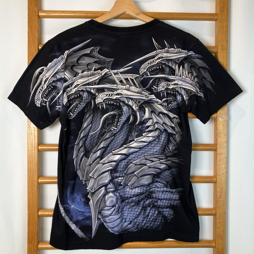 Black t-shirt with silver dragon design on a wooden hanger