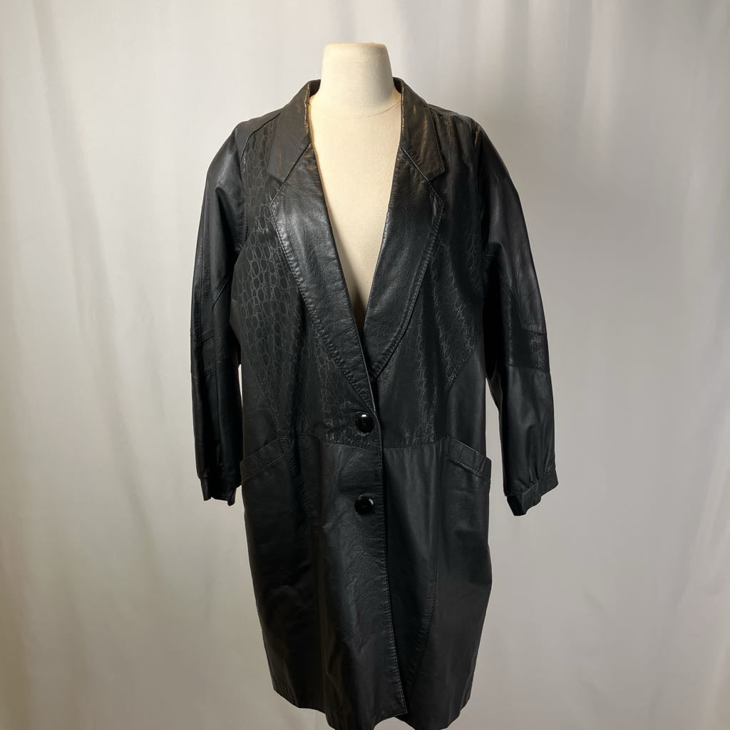 Black leather coat on a mannequin against a plain background