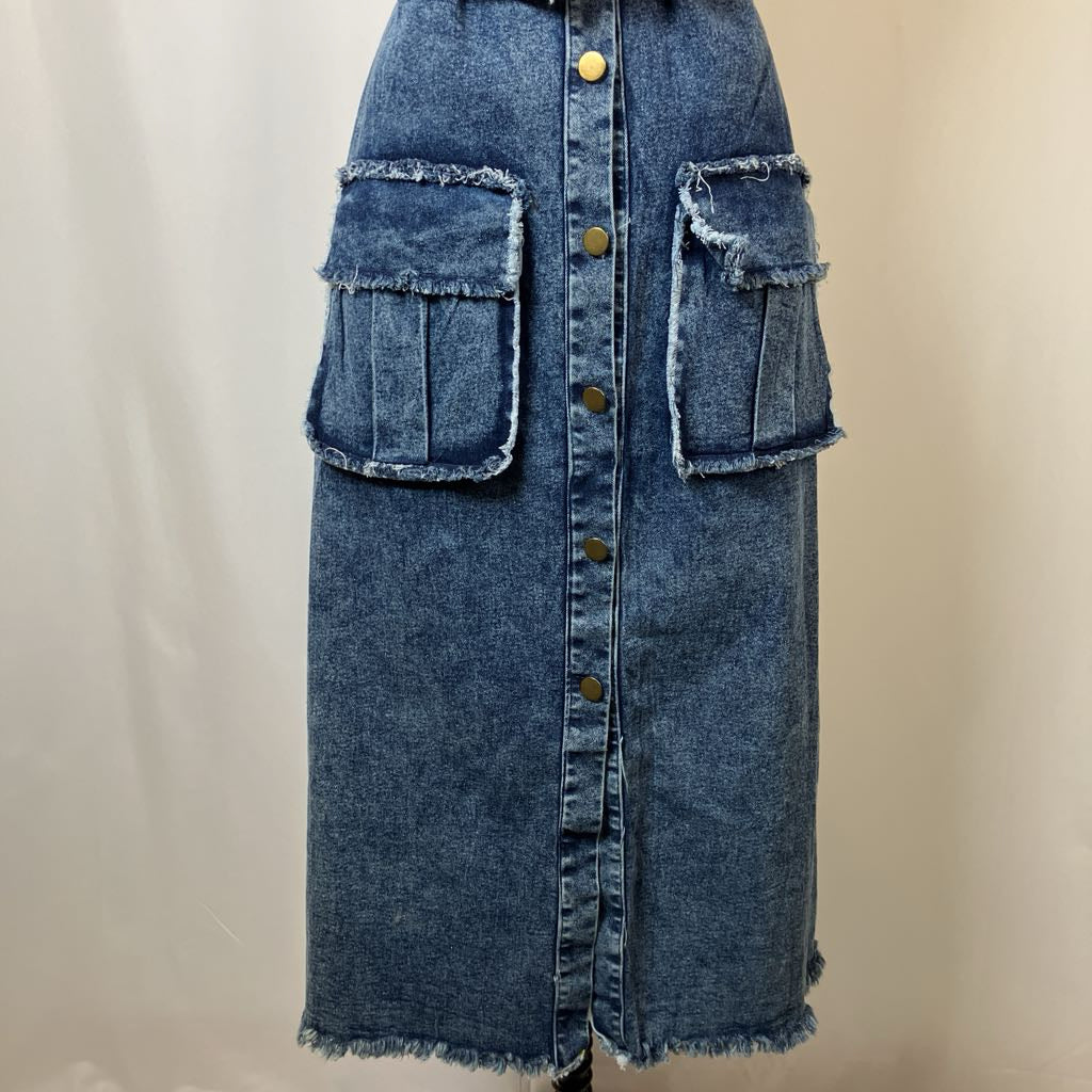 Blue denim skirt with button details on a beige background