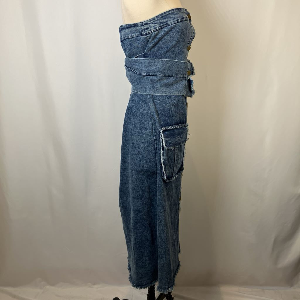 Blue denim dress on a mannequin against a plain background