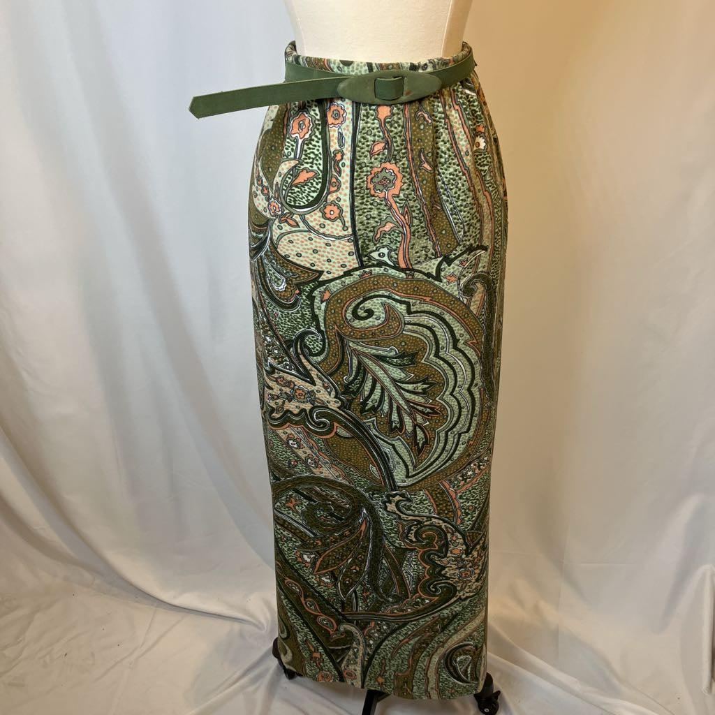 Patterned skirt with a belt on a mannequin against a plain background