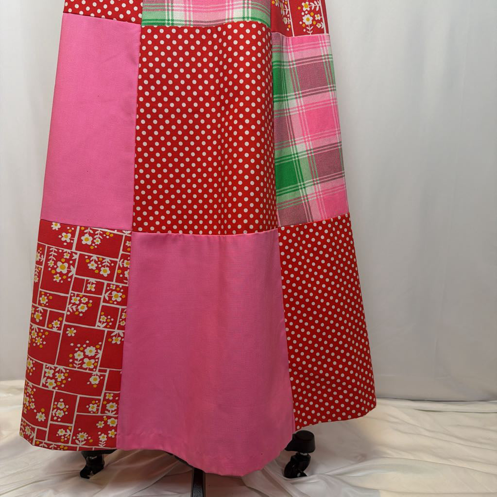 Patchwork skirt with pink, red, and plaid patterns on a white background