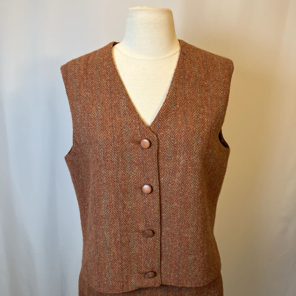 Brown textured vest on a mannequin against a plain background