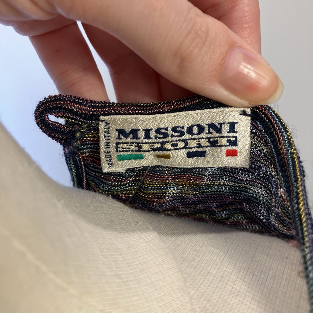 Missoni Sport label on a textured fabric background