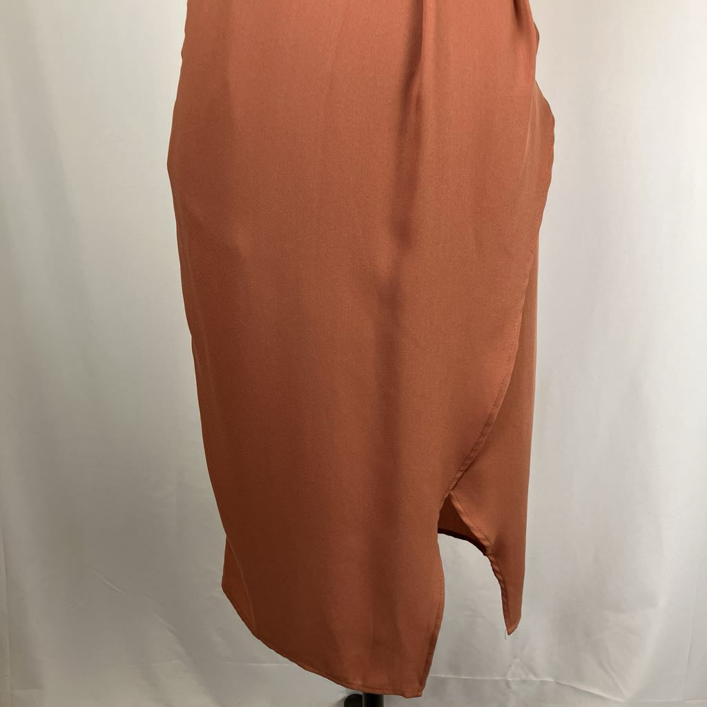 Brown skirt on a mannequin against a white background