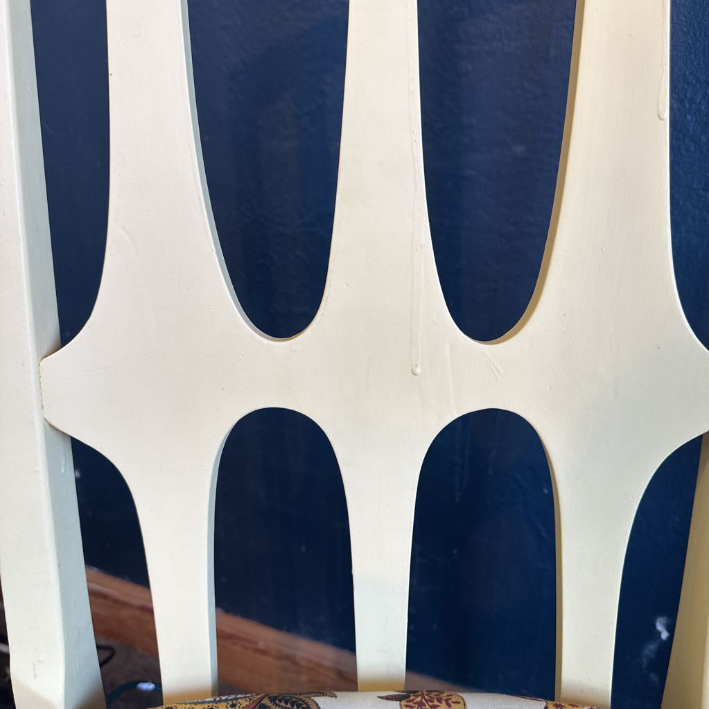 Close-up of a skateboard with blue and white design