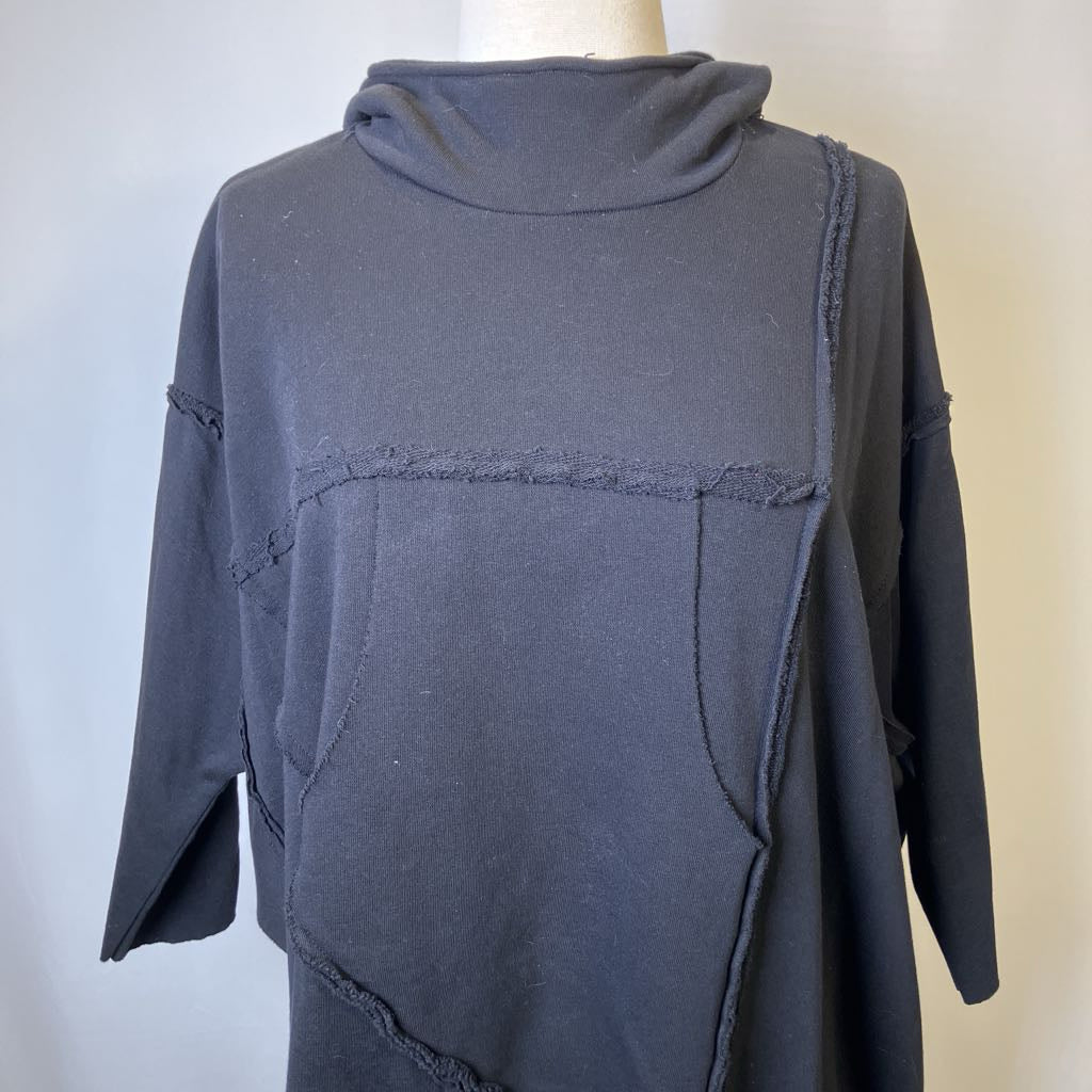 Dark gray hoodie on a mannequin against a white background