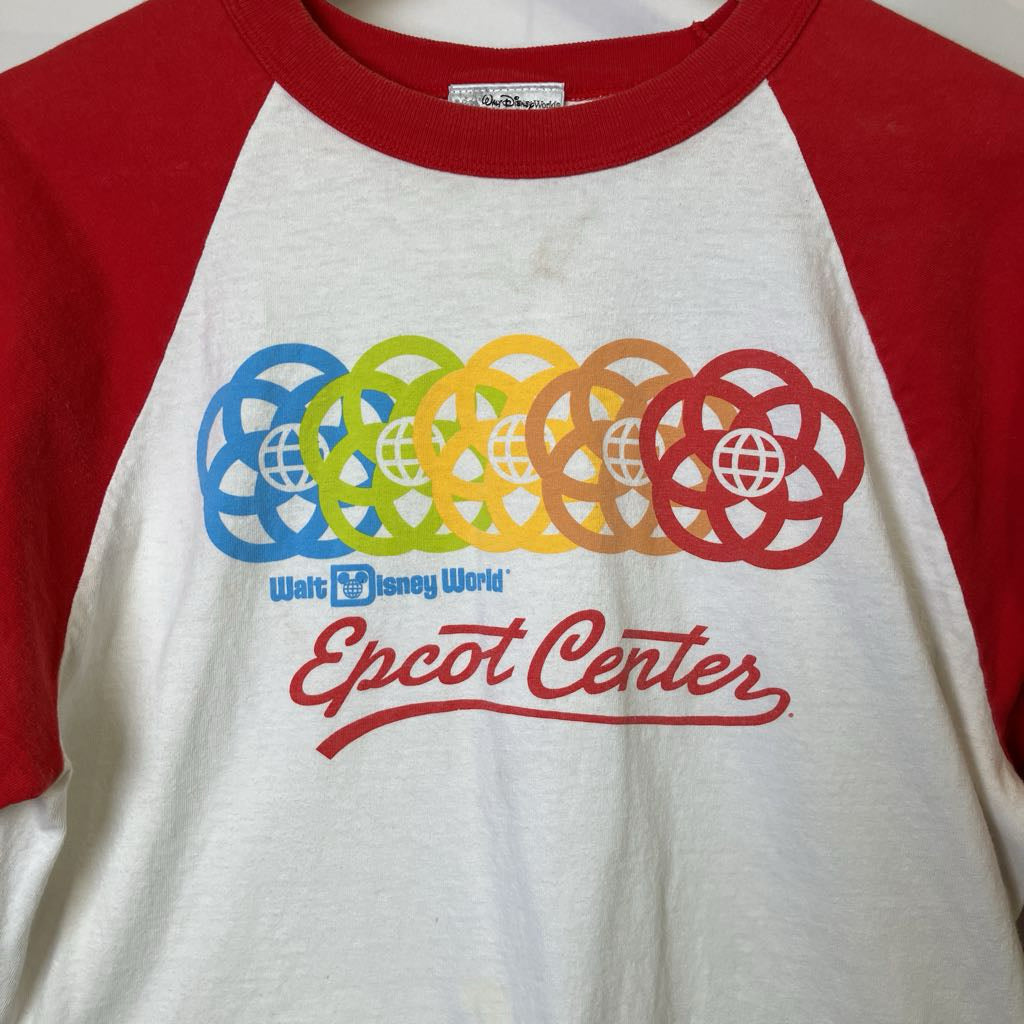 Vintage-style t-shirt with colorful环球logo and 'Epcot Center' text on a red and white background.