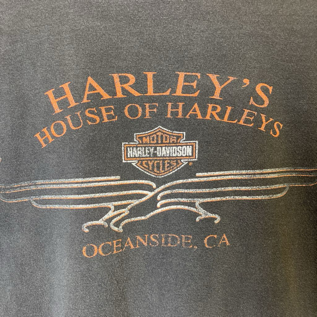 Gray shirt with 'Harley's House of Harleys' and Harley-Davidson logo.