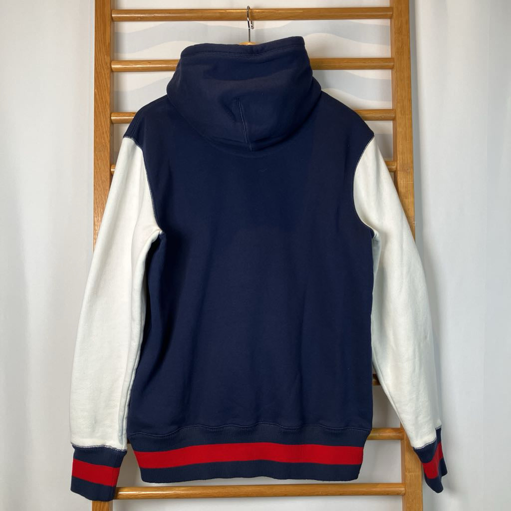 back of hoodie against a white background