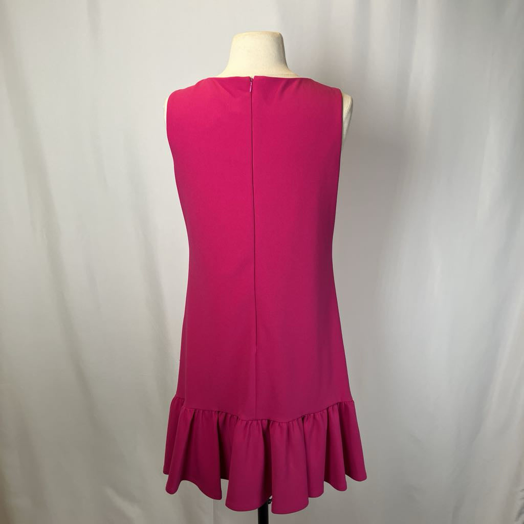 Pink drop waist dress on a mannequin against a white background. 