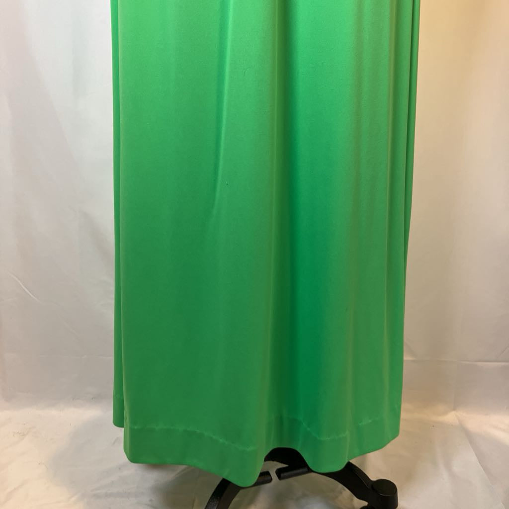 Green skirt on a mannequin against a white background