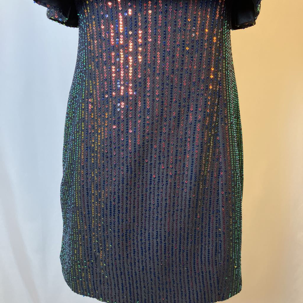 Shiny sequin dress on a plain background