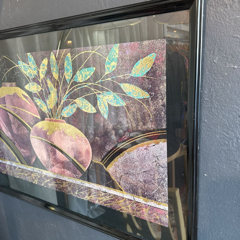 Decorative glass panel with floral design and pink vase.