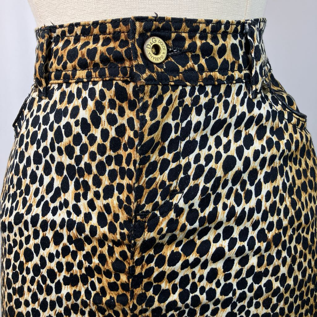 close up image of animal print skirt against white background