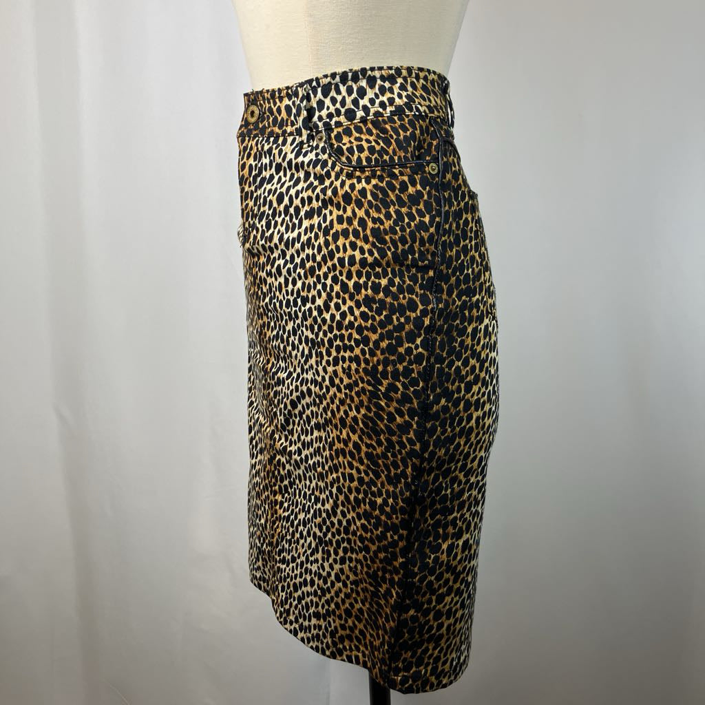 side view of animal print pencil skirt against a white background