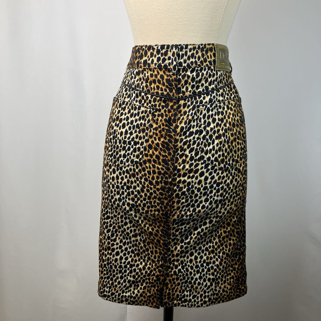 Leopard print skirt on a mannequin against a plain background