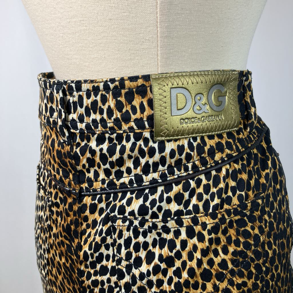 close up of D&G Label on animal print skirt against white background