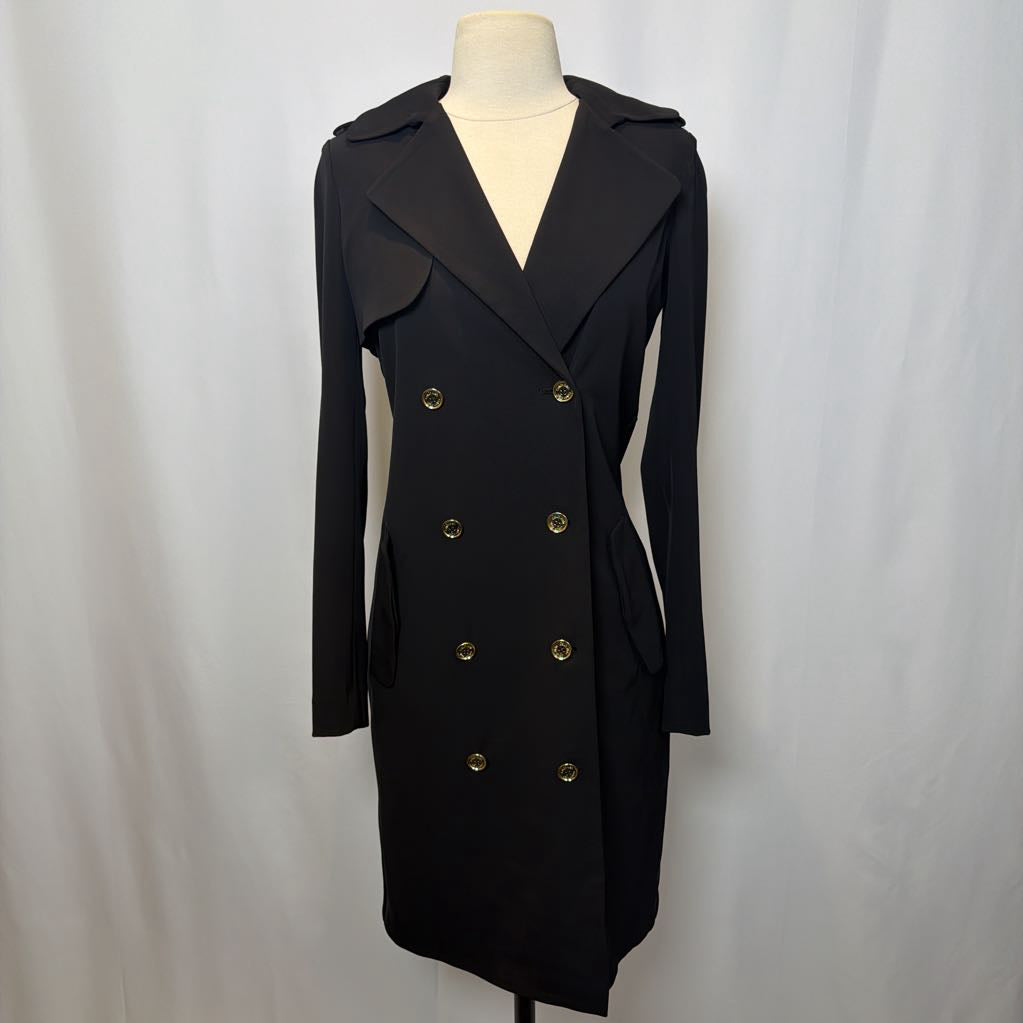 Black coat with gold buttons on a mannequin against a white background