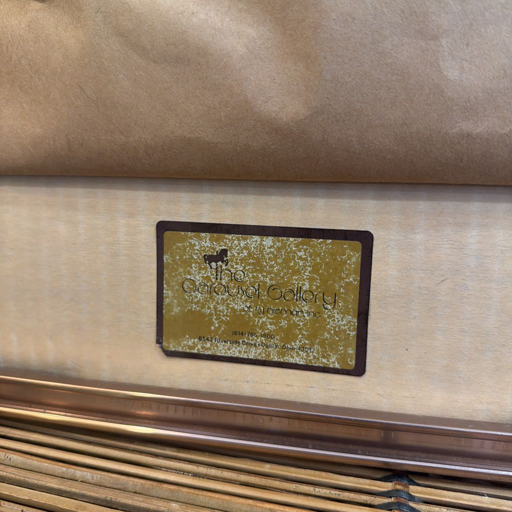 Furniture with a visible brand label on a beige background