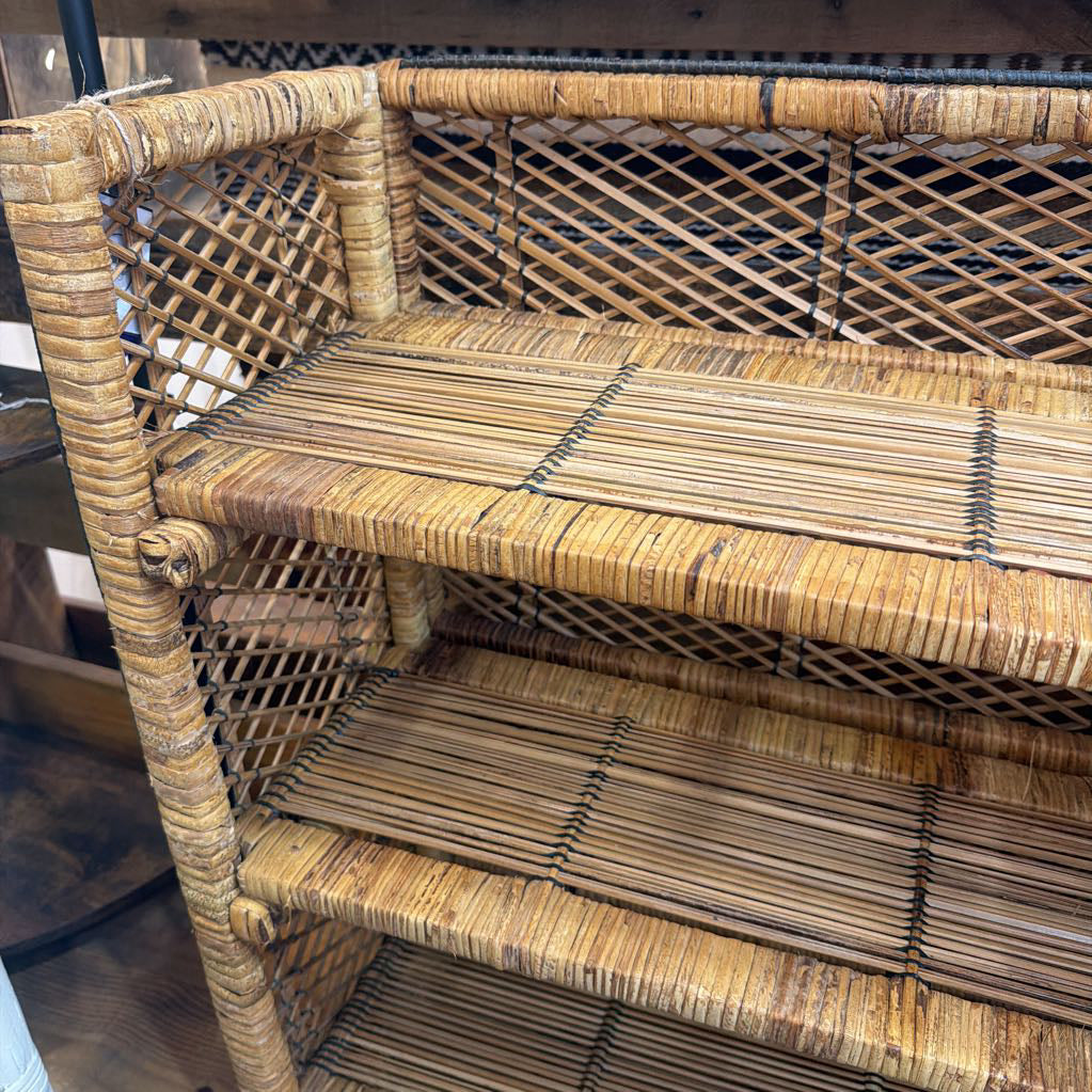 Wicker shelf with multiple shelves in a store setting