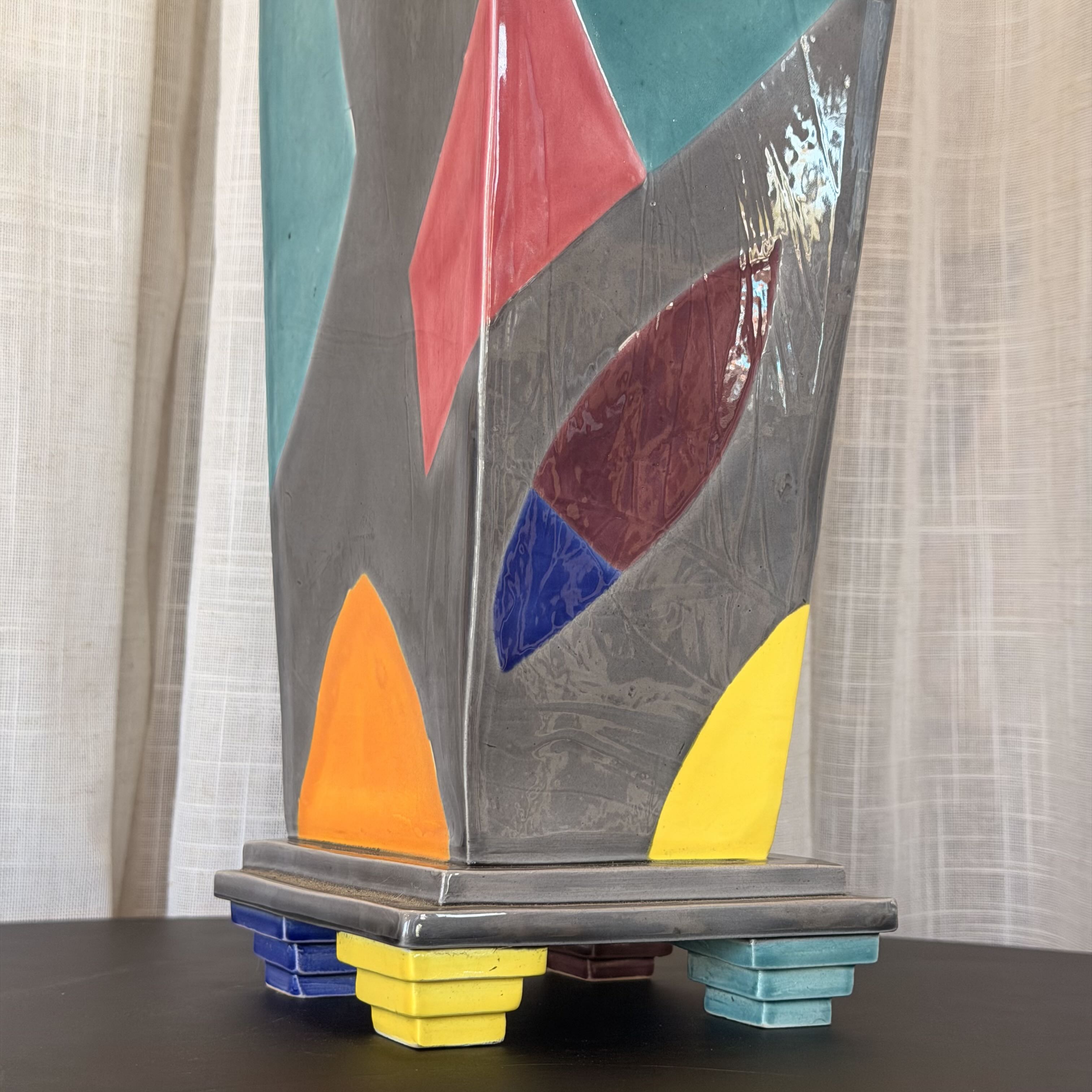 Abstract art piece with geometric shapes on a neutral background