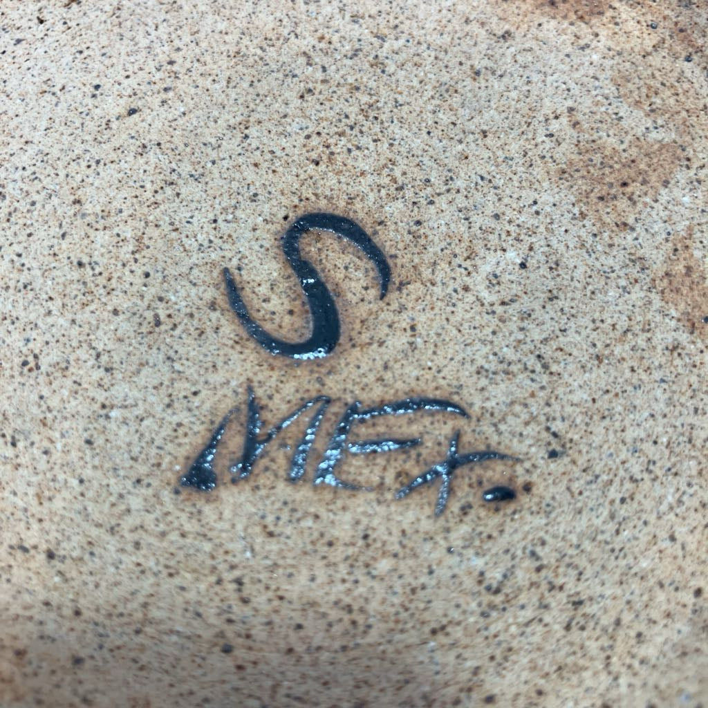 Signature on a textured surface