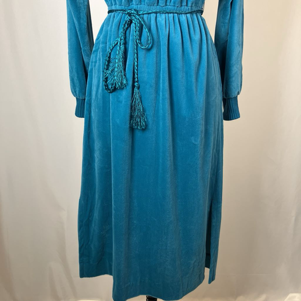 Blue dress with a belt on a white background