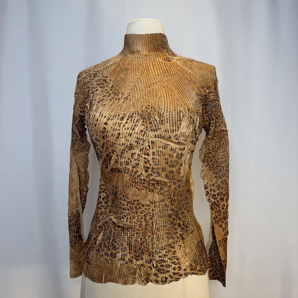 Textured brown long-sleeve top on a mannequin against a plain background
