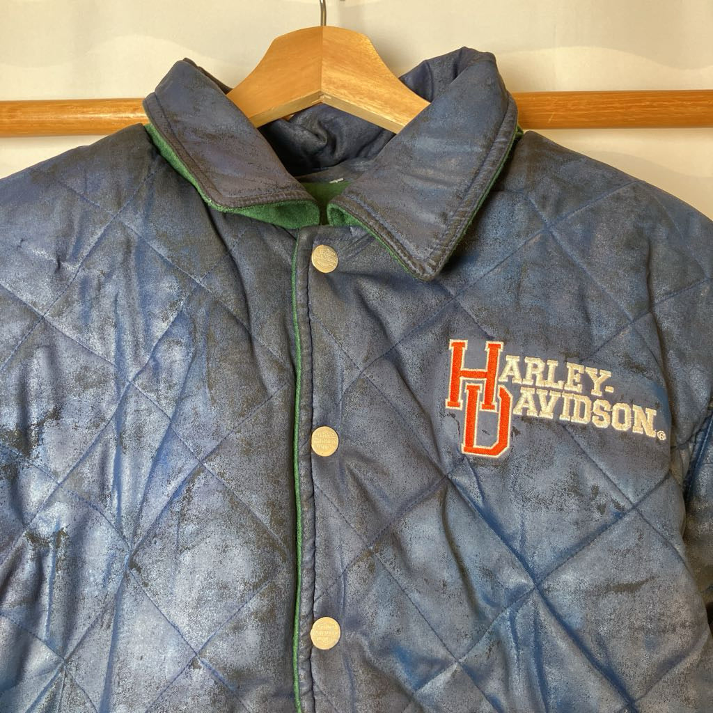Quilted jacket with Harley-Davidson logo on a hanger